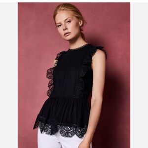 Ted Baker London black peplum lace top. Excellent condition.